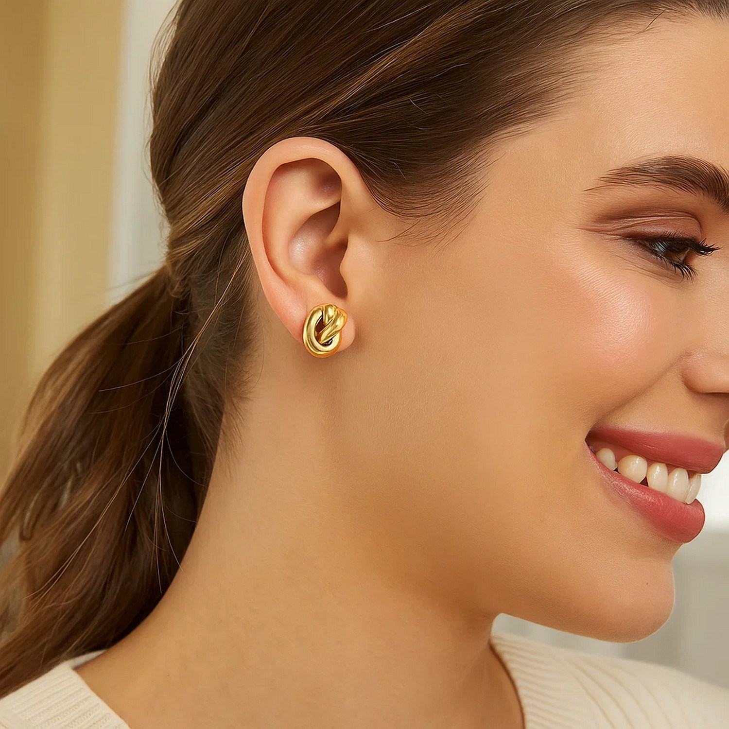 14k Yellow Gold Polished Knot Earrings - Image 2